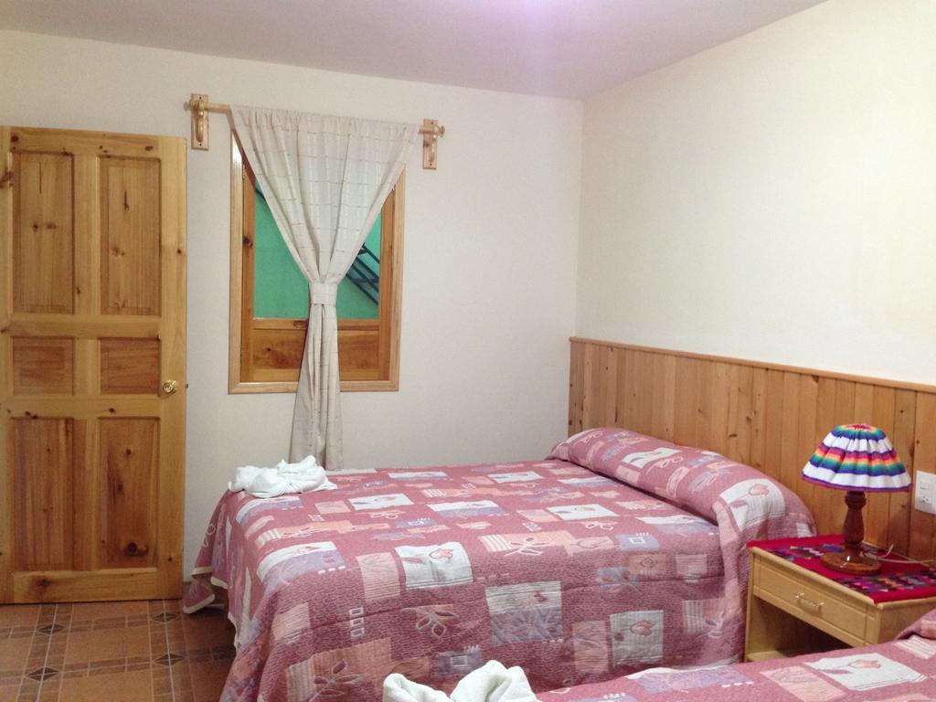 Hotel Posada Las Rosas Сан-Кристобаль-де-Ла-Касас Номер фото